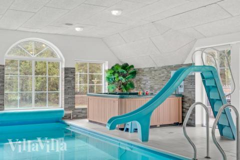 Njut av spabadets värme i lyxstuga nr 573 i Vestjylland