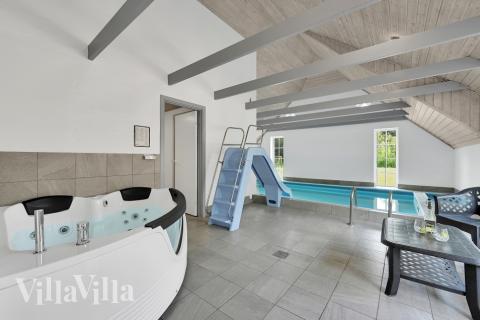 Njut av spabadets värme i lyxstuga nr 574 i Vestjylland