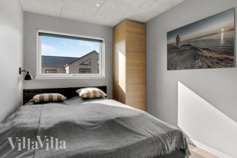 Ett av de 10 utmärkta sovrummen i lyxstuga nr 554 i Vestjylland.