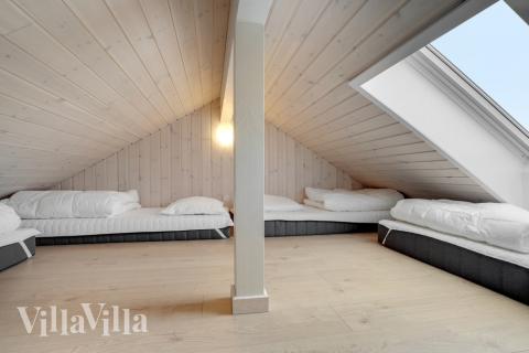 Några av de 12 sovplatserna finns på loftet i lyxstuga nr 578