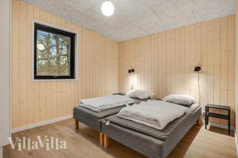 Ett av de 7 utmärkta sovrummen i lyxstuga nr 581 i Østjylland.
