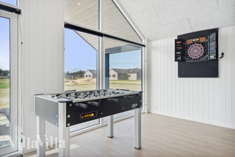 Aktivitetsrum i lyxstuga nr 583 med 9 sovrum och plats för 24 personer.