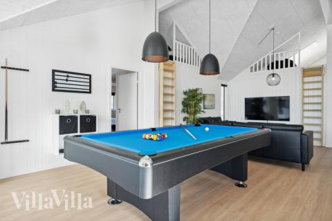 Tävla i sommarhusets aktivitetsrum när ni besöker lyxhus nr 583 i Vestjylland.