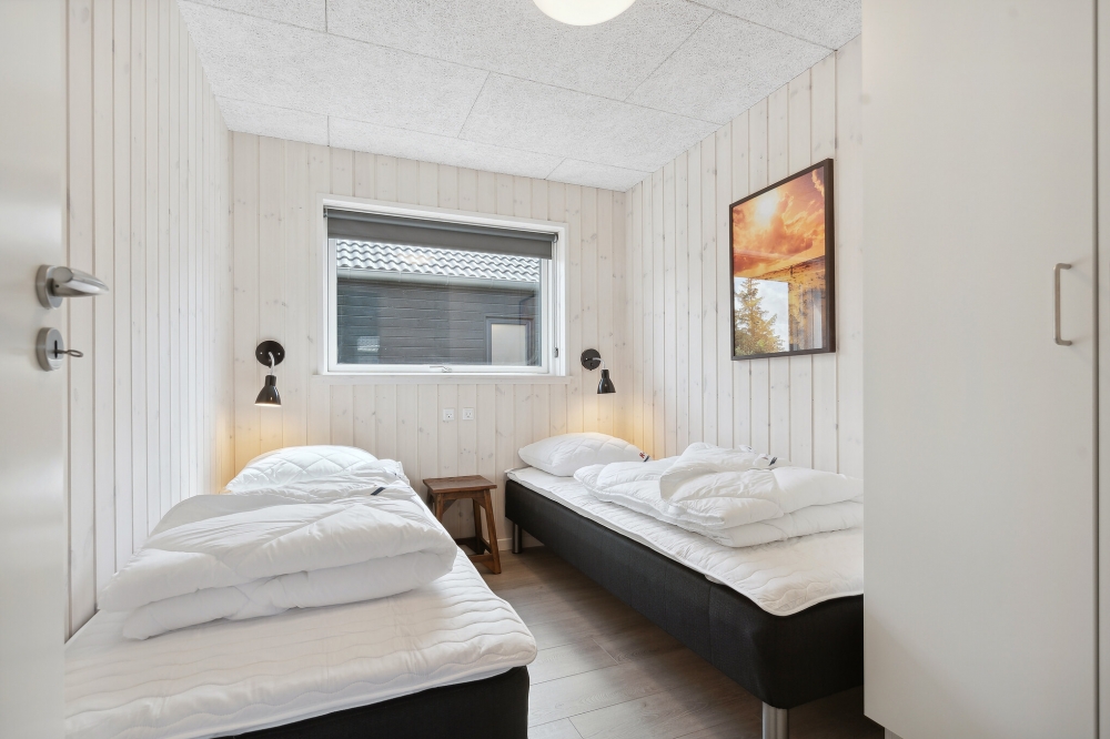 Ett av de 7 utmärkta sovrummen i lyxstuga nr 601 i Sydjylland.