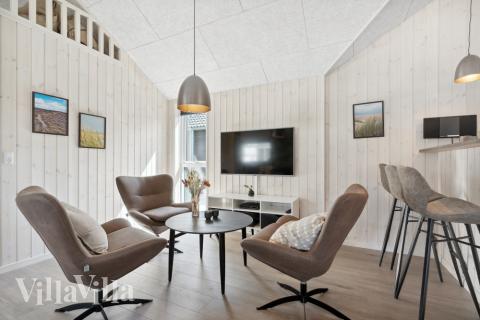 Tävla i sommarhusets aktivitetsrum när ni besöker lyxhus nr 601 i Sydjylland.