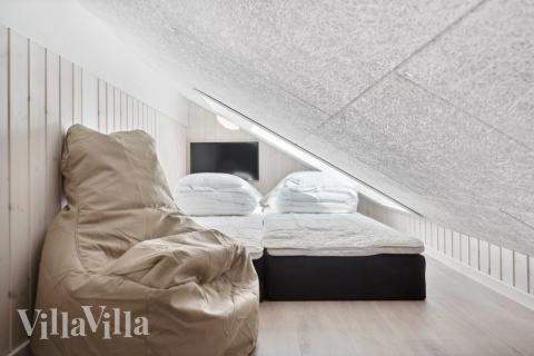 Några av de 18 sovplatserna finns på loftet i lyxstuga nr 601