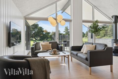 Aktivitetsrum i lyxstuga nr 596 med 8 sovrum och plats för 20 personer.