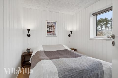 Ett av de 8 utmärkta sovrummen i lyxstuga nr 596 i Sydjylland.