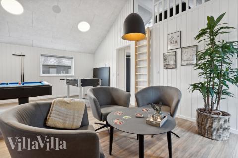 Tävla i sommarhusets aktivitetsrum när ni besöker lyxhus nr 599 i Sydjylland.
