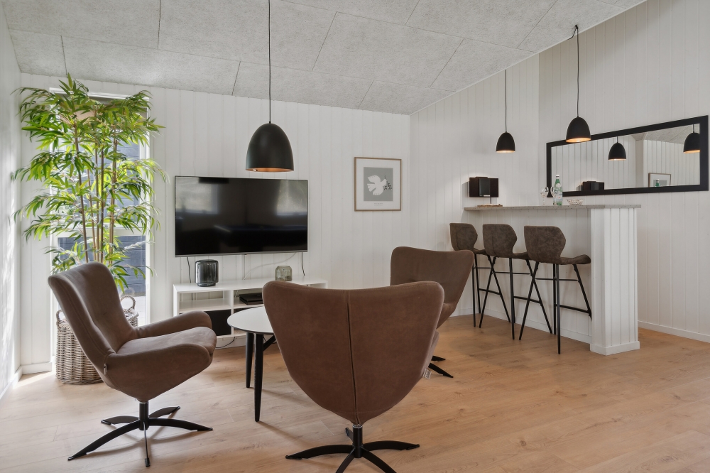 Tävla i sommarhusets aktivitetsrum när ni besöker lyxhus nr 595 i Sydjylland.