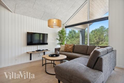 Aktivitetsrum i lyxstuga nr 585 med 9 sovrum och plats för 24 personer.