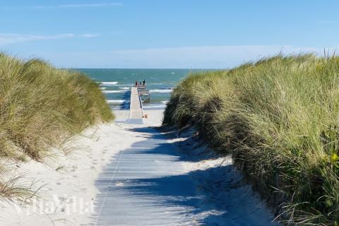 Stranden i närheten av lyxhus 602.