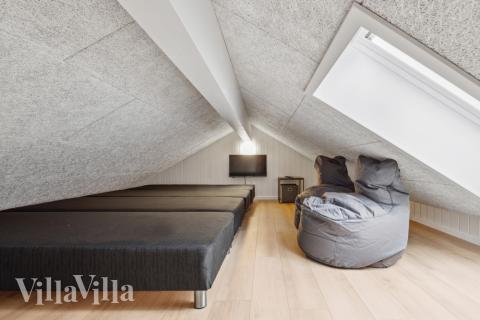 Några av de 18 sovplatserna finns på loftet i lyxstuga nr 750