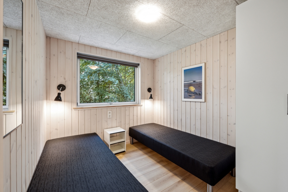Ett av de 7 utmärkta sovrummen i lyxstuga nr 750 i Tyskland.