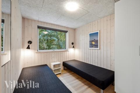 Ett av de 7 utmärkta sovrummen i lyxstuga nr 750 i Tyskland.