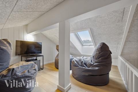 Några av de 20 sovplatserna finns på loftet i lyxstuga nr 751