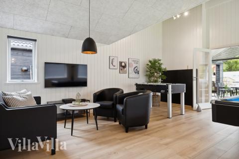 Aktivitetsrum i lyxstuga nr 755 med 6 sovrum och plats för 16 personer.