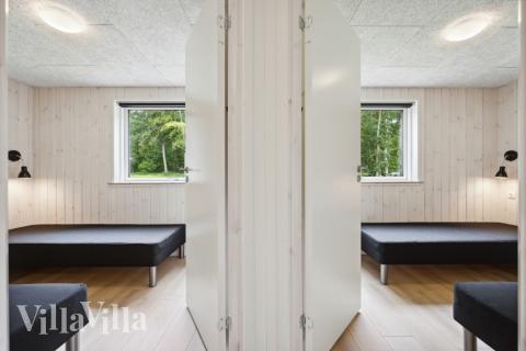 Ett av de 6 utmärkta sovrummen i lyxstuga nr 756 i Tyskland.