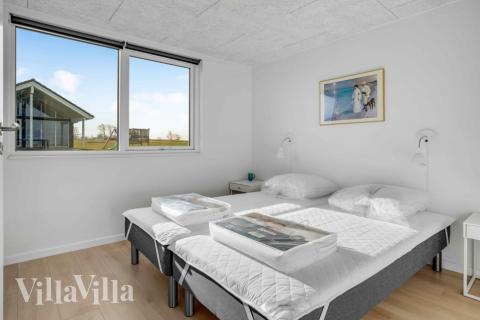 Ett av de 6 utmärkta sovrummen i lyxstuga nr 548 i Fyn och öar.