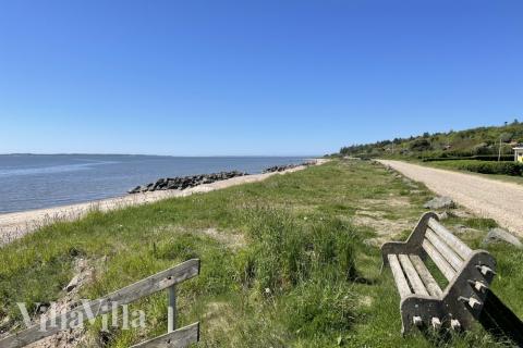 Stranden i närheten av lyxhus 603.