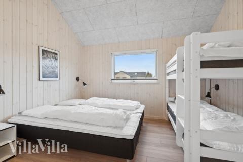 Ett av de 10 utmärkta sovrummen i lyxstuga nr 608 i Vestjylland.