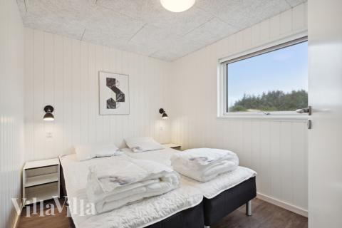 Ett av de 7 utmärkta sovrummen i lyxstuga nr 609 i Vestjylland.