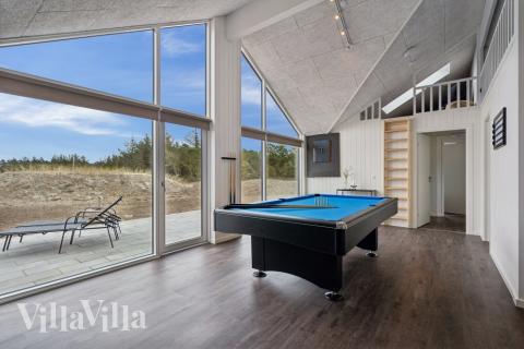 Aktivitetsrum i lyxstuga nr 610 med 7 sovrum och plats för 18 personer.