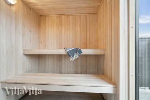 Njut av bastuvärmen i lyxstuga nr 610 för 18 personer