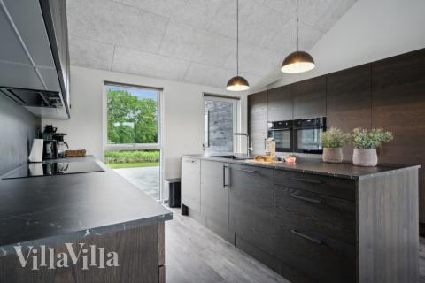 Köket i lyxstuga nr 611 är utrustat så att ni kan laga mat till 20 personer.