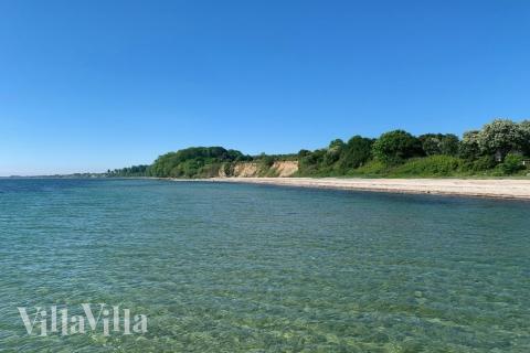 Stranden i närheten av lyxhus 612.