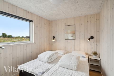 Ett av de 5 utmärkta sovrummen i lyxstuga nr 617 i Fyn och öar.