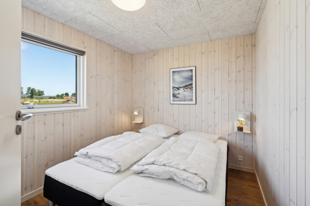 Ett av de 6 utmärkta sovrummen i lyxstuga nr 618 i Fyn och öar.