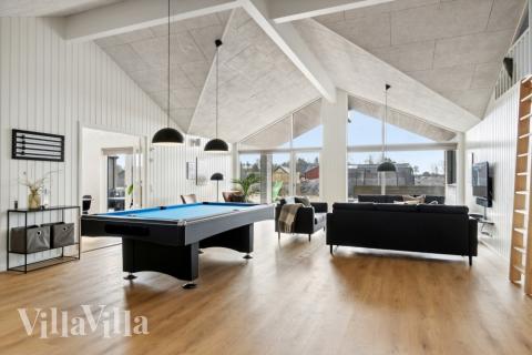 Förutom de många timmar som du kan tillbringa i stugans poolavdelning erbjuder lyxstuga 619 även biljard, bordtennis och dart