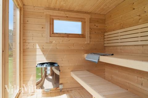 Njut av bastuvärmen i lyxstuga nr 620 för 12 personer