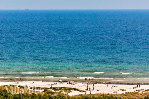 Stranden i närheten av lyxhus 622.