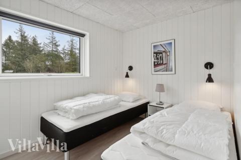 Ett av de 5 utmärkta sovrummen i lyxstuga nr 624 i Sydjylland.