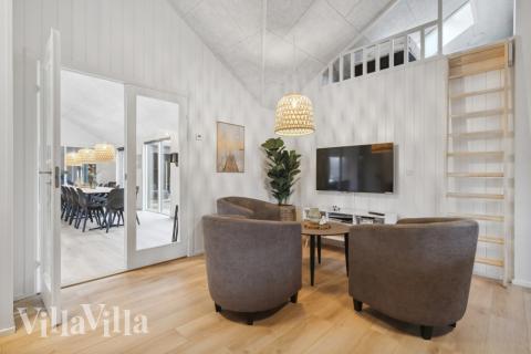 Tävla i sommarhusets aktivitetsrum när ni besöker lyxhus nr 627 i Vestjylland.