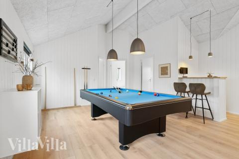 Aktivitetsrum i lyxstuga nr 627 med 8 sovrum och plats för 20 personer.