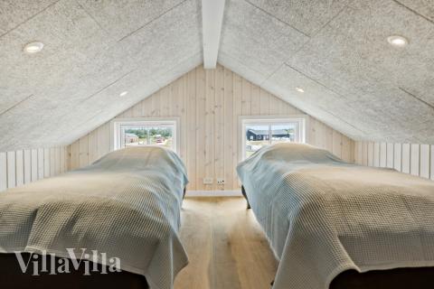 Några av de 20 sovplatserna finns på loftet i lyxstuga nr 629