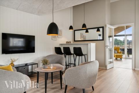 Den härliga sommarstugan bjuder bland annat på en bar som denna i lyxstuga 634 i Nordjylland