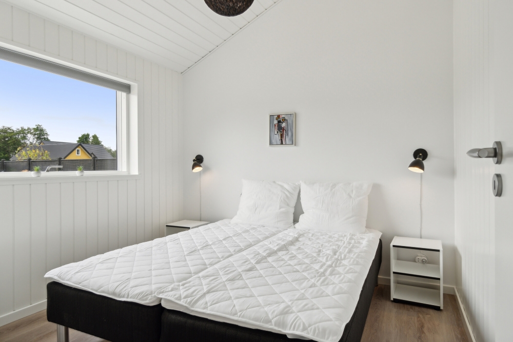 Ett av de 4 utmärkta sovrummen i lyxstuga nr 636 i Nordjylland.