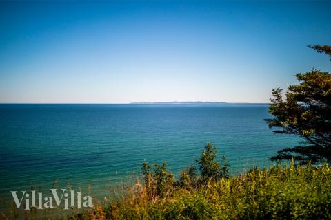 Stranden i närheten av lyxhus 638.