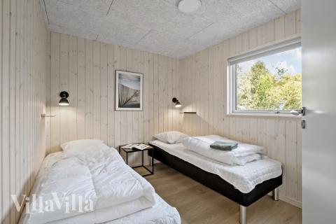 Ett av de 6 utmärkta sovrummen i lyxstuga nr 638 i Nordsjälland.