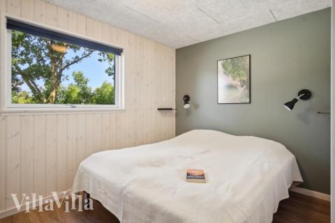 Ett av de 5 utmärkta sovrummen i lyxstuga nr 640 i Østjylland.