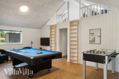 Aktivitetsrum i lyxstuga nr 640 med 5 sovrum och plats för 14 personer.