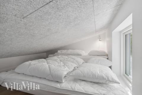 Några av de 20 sovplatserna finns på loftet i lyxstuga nr 641