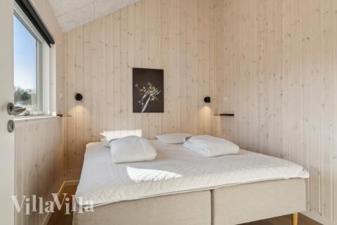 Ett av de 7 utmärkta sovrummen i lyxstuga nr 646 i Nordsjälland.