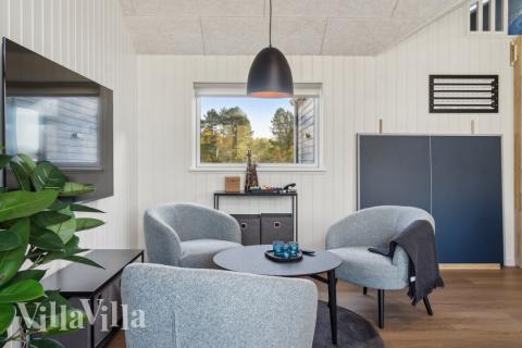 Aktivitetsrum i lyxstuga nr 646 med 7 sovrum och plats för 18 personer.