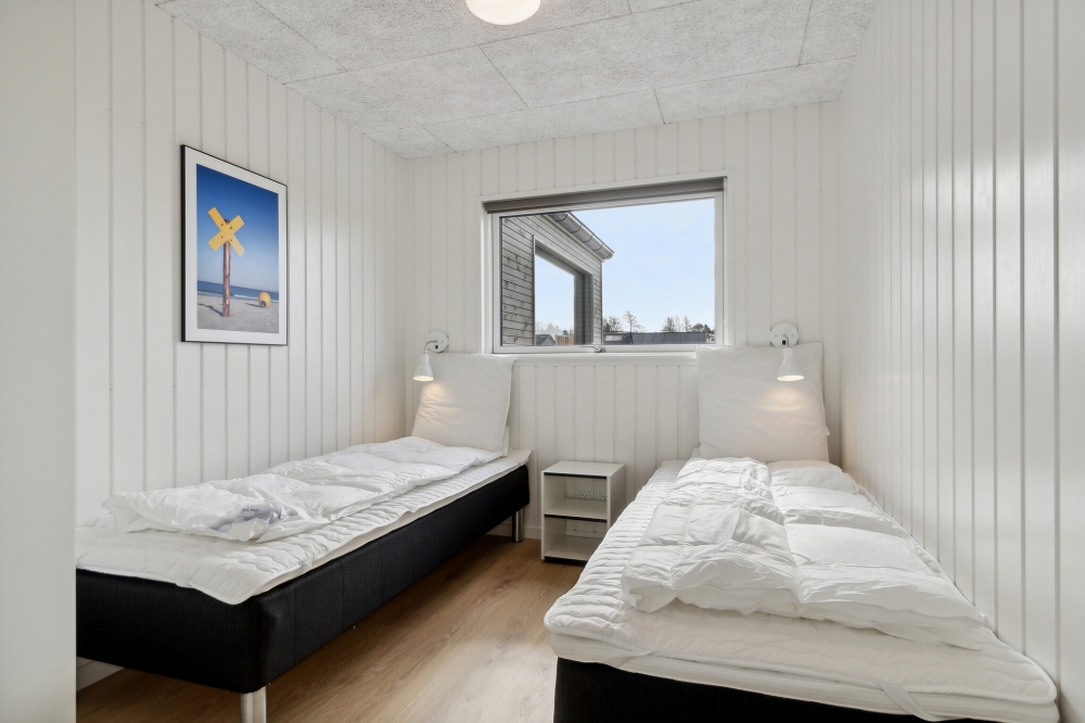 Ett av de 12 utmärkta sovrummen i lyxstuga nr 806 i Østjylland.