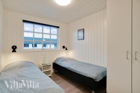 Ett av de 7 utmärkta sovrummen i lyxstuga nr 810 i Østjylland.